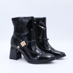 جزمة كعب بسحاب جلد للنساء لون أسود لميع