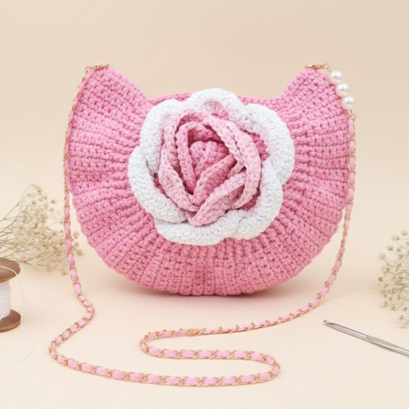 ⁦شنطة وردة مع يد سلسلة لون زهري - نكشة فن⁩ - الصورة ⁦1⁩