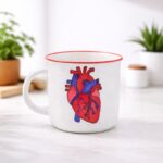 ⁦مج بورسلات برسومات القلب لون ابيض⁩ - الصورة ⁦2⁩