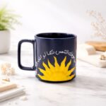 مج بورسلان بتصميم ( ستخرج من جوفك الشمس كما لو انك الشروق) لون اسود