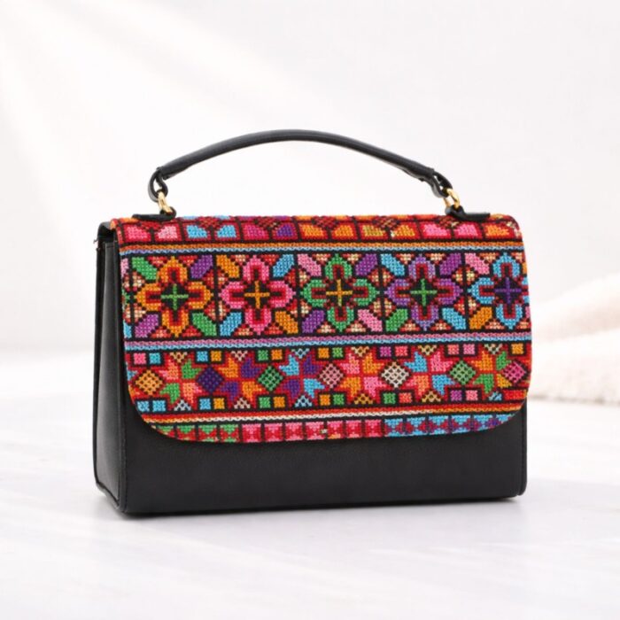 ⁦حقيبه تطريز مع سحاب لون اسود⁩ - الصورة ⁦2⁩