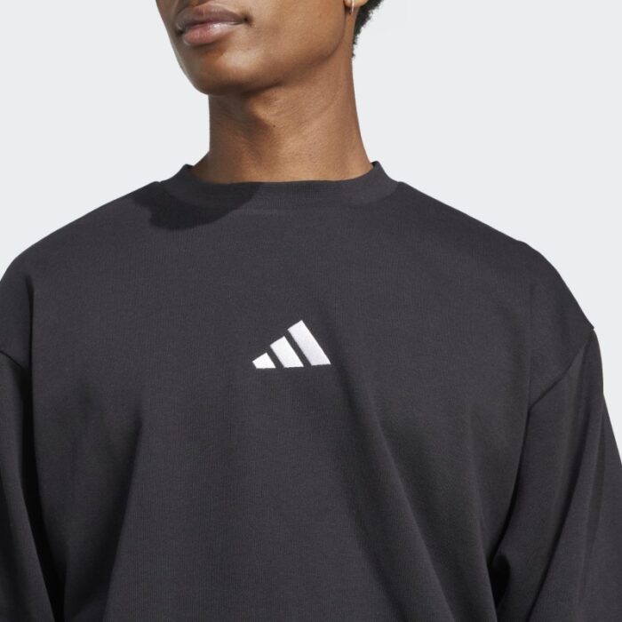 ⁦adidas Men's Essentials Feelcozy Fleece Sweatshirt - Black⁩ - الصورة ⁦6⁩