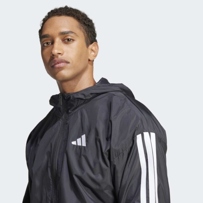 ⁦adidas Men's Essentials 3-Stripes Windbreaker - Black⁩ - الصورة ⁦5⁩