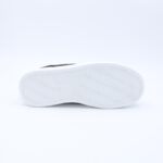 حذاء رياضي كلاسيك جلد للنساء لون أسود وأبيض