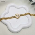 سوار سلسلة مع وردة اقحوان لون ذهبي