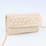 شنطة حبة الحمص مع فاصل داخلي لون عاجي - نكشة فن