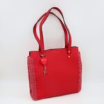 شنطة جلد جوانب كروشية مع يد جلد لون أحمر - نكشة فن