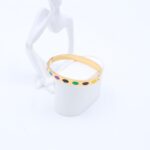 سوار لون ذهبي ودوائر ملونة