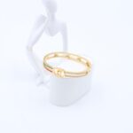 سوار لون ذهبي مع زركون فضي وتفاصيل أحمر وأخضر