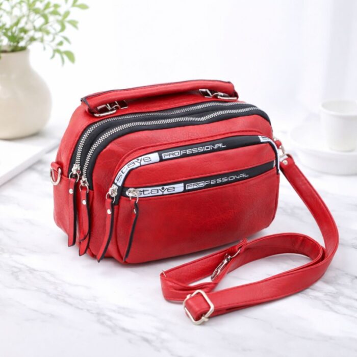 ⁦شنطة حقيبة جلد يد او كتف صغيرة stave تصميم سبورت لون احمر⁩ - الصورة ⁦7⁩