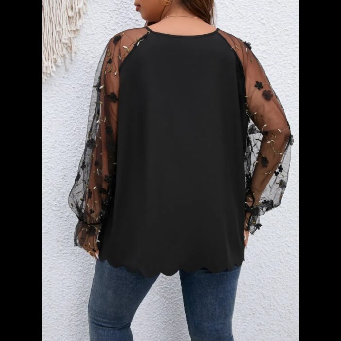 ⁦بلوزة ستاتي بأكمام شفافة لون اسود⁩ - الصورة ⁦3⁩