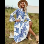 فستان نسائي بأكمام طويلة لون أبيض مزخرف أزرق