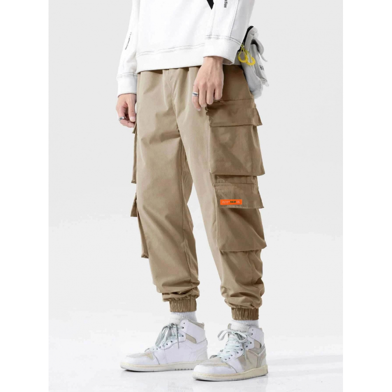 ⁦بنطلون بتصميم جيوب ولادي لون بيج⁩ - الصورة ⁦1⁩