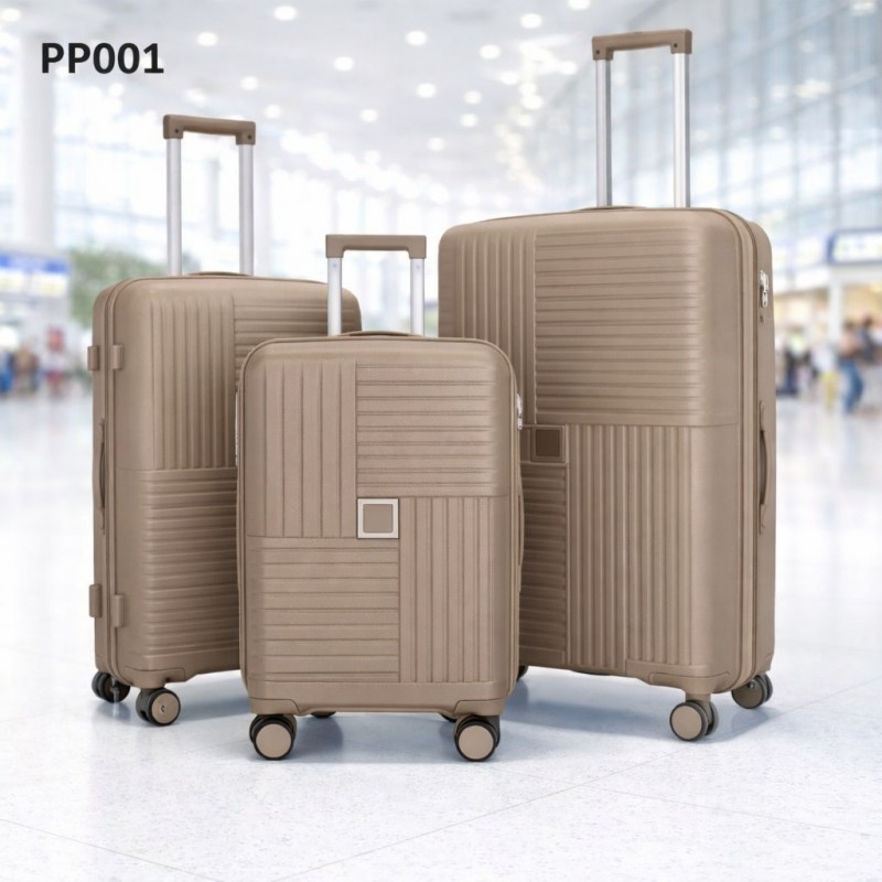 ⁦طقم شنط سفر 3 قطع بأحجام مختلفة لون ذهبي بارد⁩ - الصورة ⁦1⁩